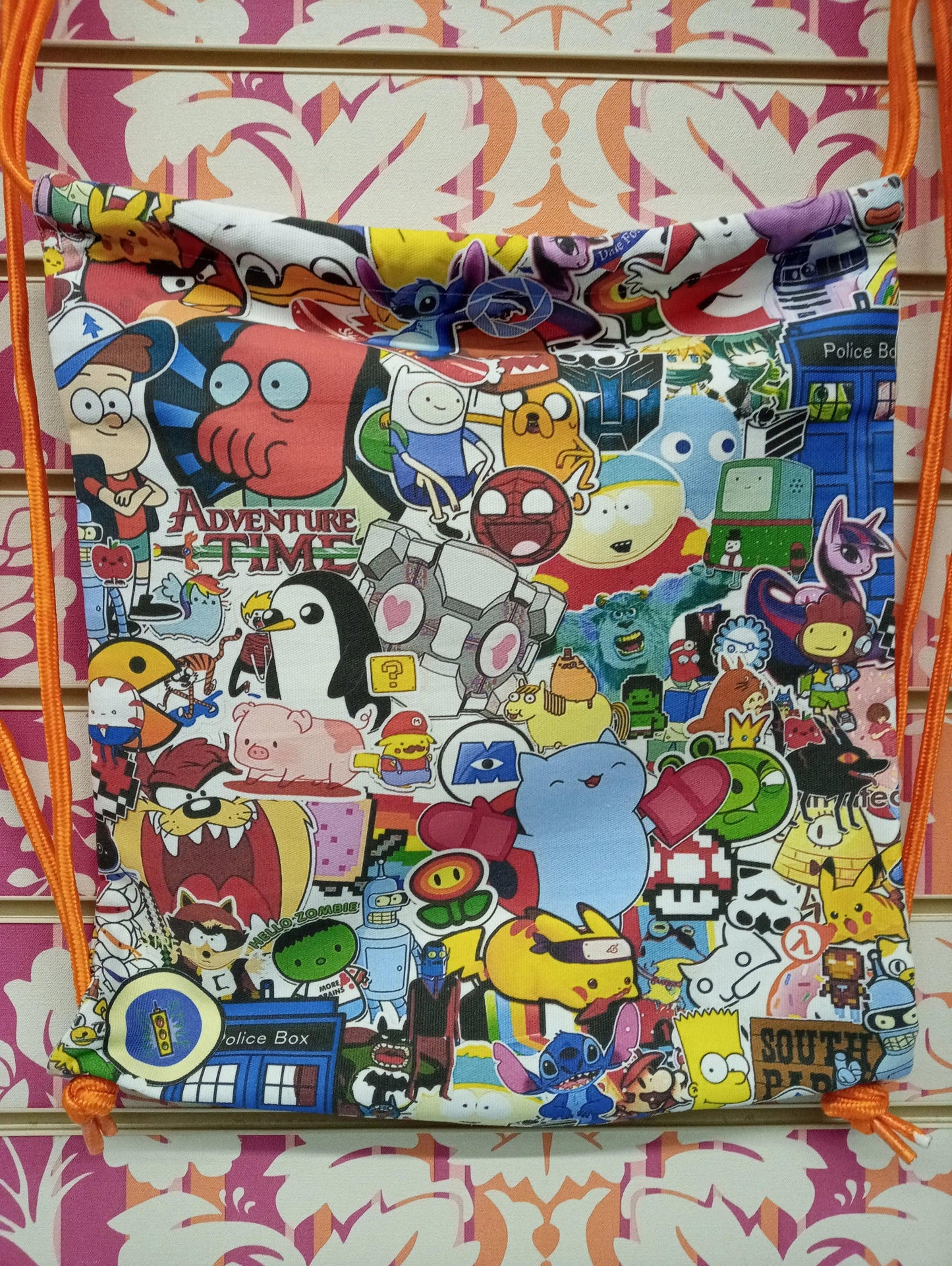 Zaino a sacca street style con stampa graffiti cartoon colorata, icone pop e urban art.