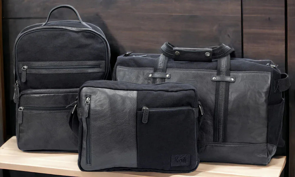 K0022AB | Messenger in Canvas/Genuine Leather, full grain, flywheel - Black colour. Antique Nickel accessories, Top zip closure. Dimensions: 35 x 26 x 10 cm. Packaging: TNT bag - STREET STYLE