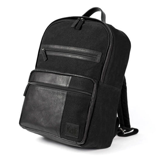 K0023AB | Notebook backpack in Canvas/Genuine Leather, full grain, flywheel - Black colour. Accessories in antiqued nickel, zip closure. Dimensions: 29 x 40 x15 cm. Packaging: TNT bag - STREET STYLE