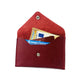 K0040VB | Sachet with flap Made in Italy in genuine full grain leather, dollar grain - Red color - Dimensions: 13 x 8 x 0.5 cm - Packaging: Rigid bottom/lid gift box - STREET STYLE