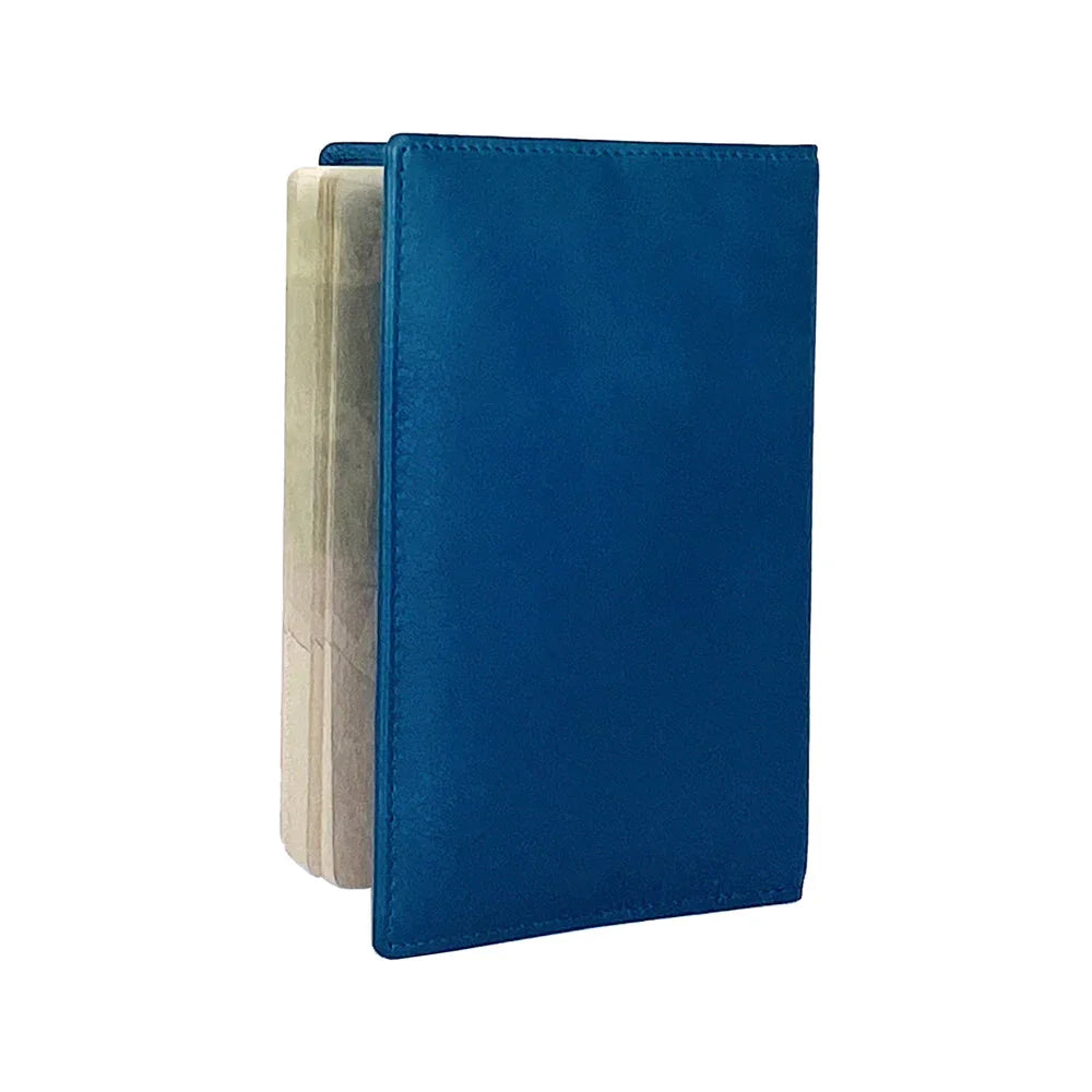 K10237MB | Passport Cover in Genuine Full Grain Leather, with light grain. Color Blue Jeans. Dimensions when closed: 10 x 14 x 1 cm - Packaging: Rigid bottom/lid gift box - STREET STYLE