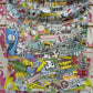 Zaino a sacca streetwear con graffiti multicolore e stickers urban, stile street style Rimini