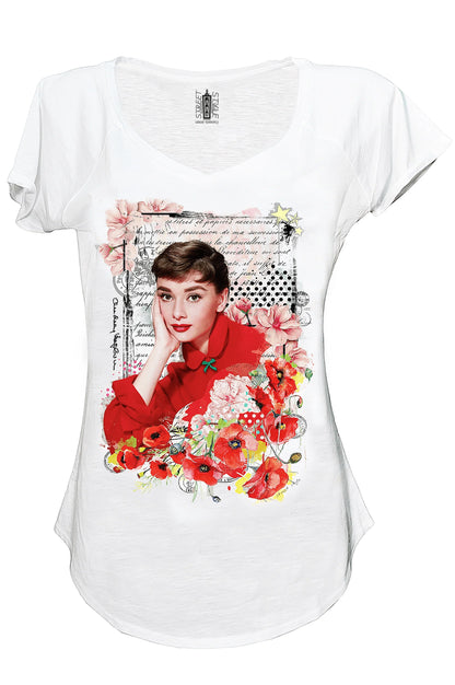 T-shirt donna bianca cotone, stampa floreale colorata stile streetwear urban, immagine femminile iconica.