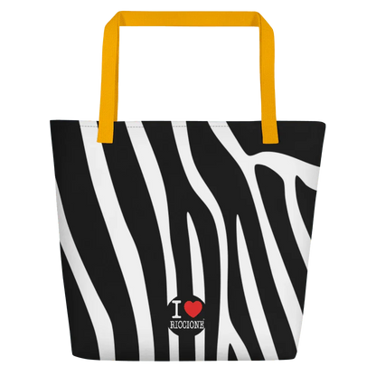 Shopper streetwear con stampa zebrata bianca e nera, manici gialli, scritta I love Riccione