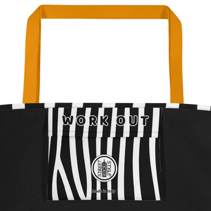 Borsa mare streetwear nera con manici arancioni, dettaglio tasca zebrata bianca e nera, scritta WORK OUT, stile urban.