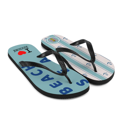 Infradito streetwear urban con base azzurra, dettagli neri, scritte blu e grafiche ancora